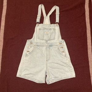 Levi’s vintage light wash denim overall shorts; size S